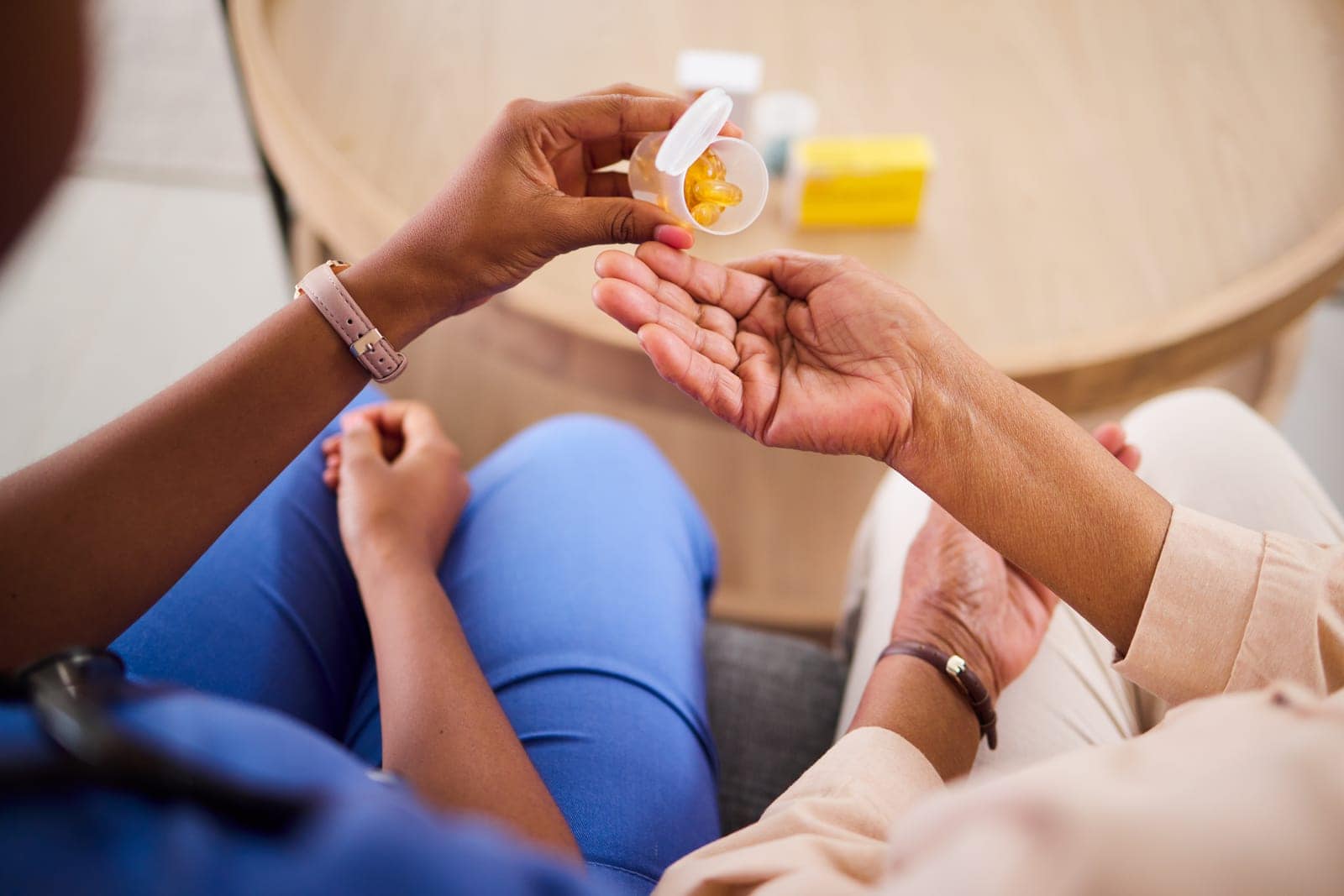 At home carer administers medication